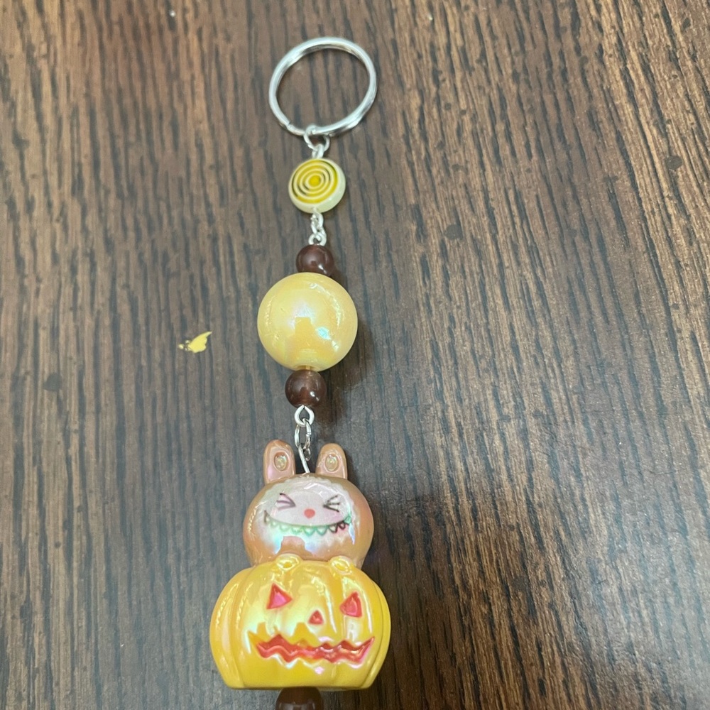 Labubu keychain (popmart, pumpkin labubu)